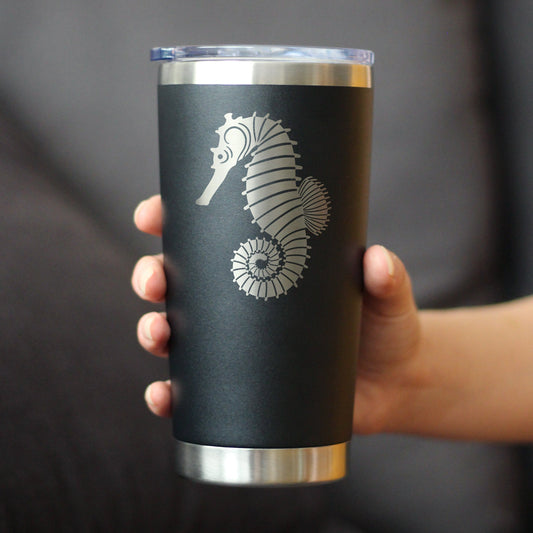Seahorse 20 oz coffee tumbler in matte black with white shell graphic on Tampa Home & Garden Store