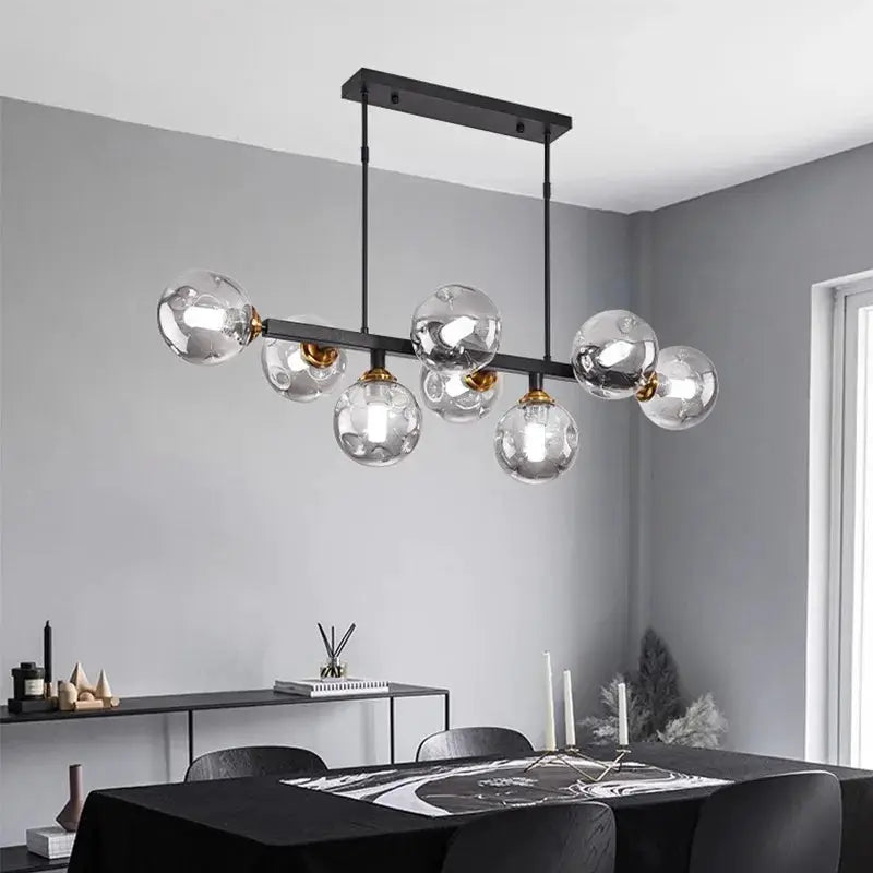 DecorBites LED pendant chandelier with glass globes on a black metal bar for dining rooms on Tampa Home & Garden Store