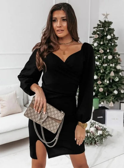 Women’s black V-neck dress with puff sleeves, knee-length, paired with Gucci clutch on Tampa Home & Garden Store