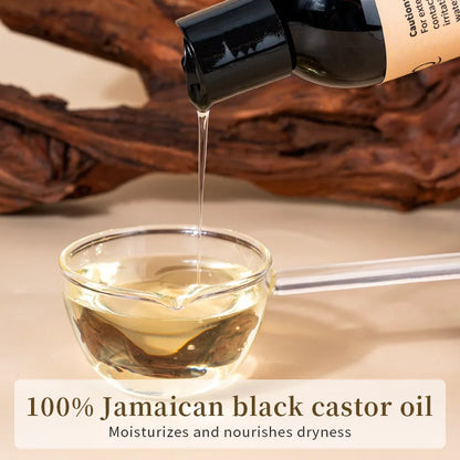 100% Jamaican black castor oil bottle pouring into glass cup 237ml Silcy Skin on Tampa Home & Garden Store