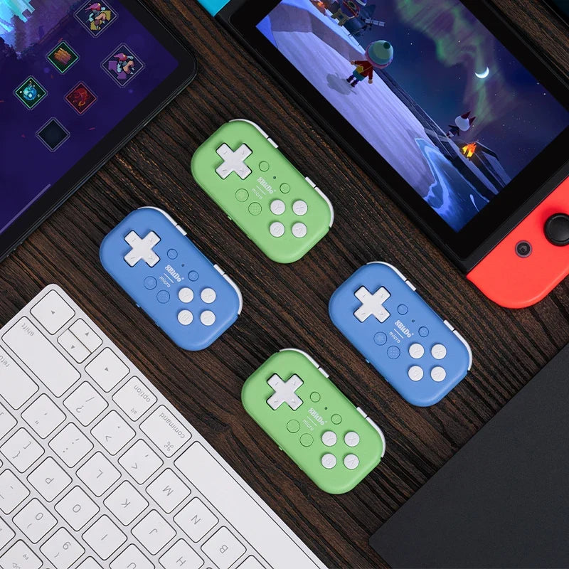 8BitDo Micro Bluetooth Wireless Gamepad set of four in blue and green with white buttons on Tampa Home & Garden Store