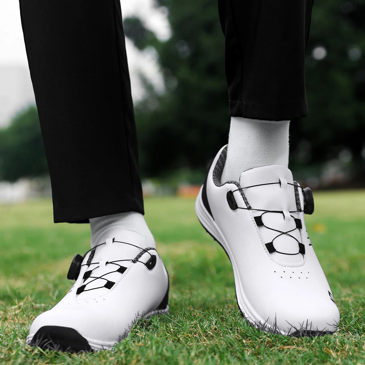 EstaliosFit Golf Shoes white with black laces, unisex anti-slip outdoor footwear pair on grass on Tampa Home & Garden Store