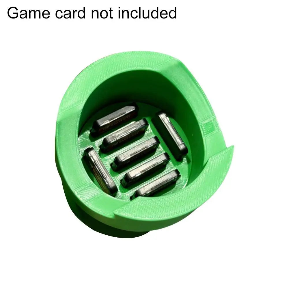 Green plastic game controller charging stand with metal contact pins for Switch and Xbox on Tampa Home & Garden Store