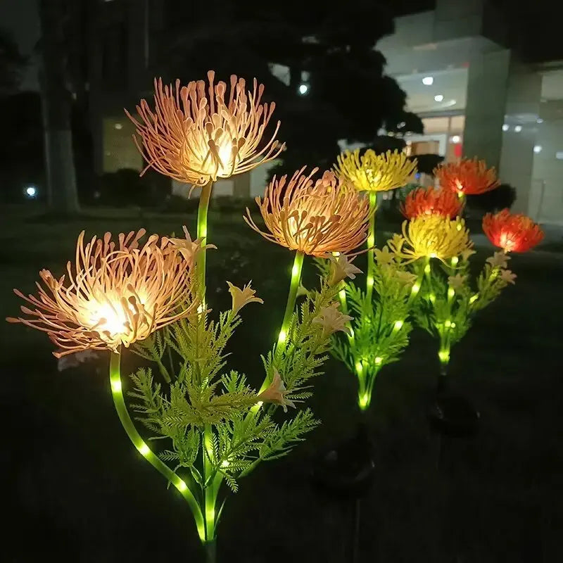 Perfecsy solar Bian flower LED garden lights with stems and warm blooms along a night walkway on Tampa Home & Garden Store