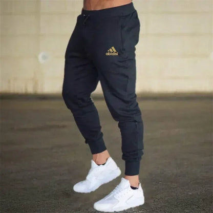 Men black baggy joggers with drawstring waist and cuffed ankles, gold logo on thigh UpTrend Deals on Tampa Home & Garden Store