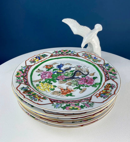 Five large porcelain Asian plates with dragon and peony motifs, stacked on Tampa Home & Garden Store