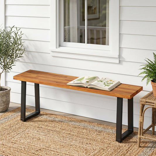 47.5in Acacia Wood Outdoor Bench with Black Metal Legs on a white siding porch DirectDeals on Tampa Home & Garden Store