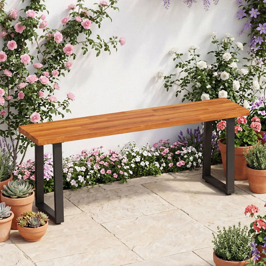 47.5-inch acacia wood patio bench with black metal legs amid pink and white roses in a garden on Tampa Home & Garden Store