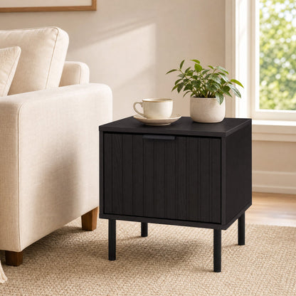 Modern black nightstand with vertical striped drawer, plant and teacup on top on Tampa Home & Garden Store