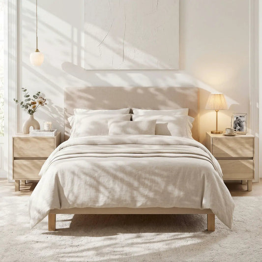 Wooden end tables set of 2 with storage drawers in light natural finish beside a bed on Tampa Home & Garden Store