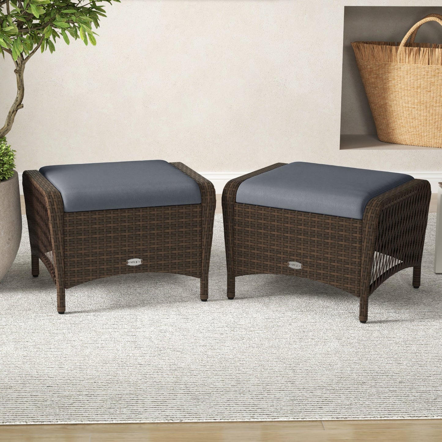 Outdoor PE wicker ottomans set of 2 by DirectDeals with removable blue cushions on Tampa Home & Garden Store