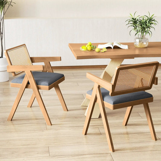 Set of 2 rattan accent chairs with padded gray cushions, natural wood frame on Tampa Home & Garden Store