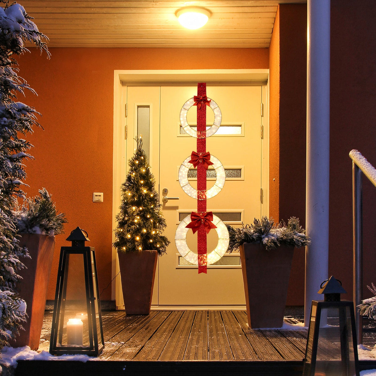 DirectDeals set of 3 Christmas lighted wreaths with warm white LEDs and red bows on front door on Tampa Home & Garden Store