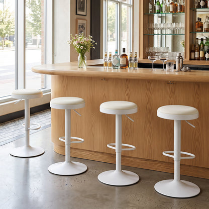 Adjustable swivel bar stools set of 4 with beige padded seats and white bases at a wooden bar on Tampa Home & Garden Store