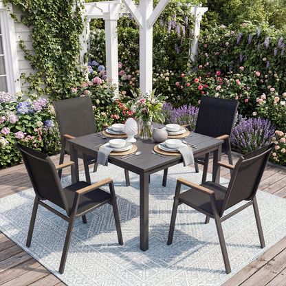 DirectDeals stackable patio dining chairs set of 4 highback charcoal gray with arms around table on Tampa Home & Garden Store