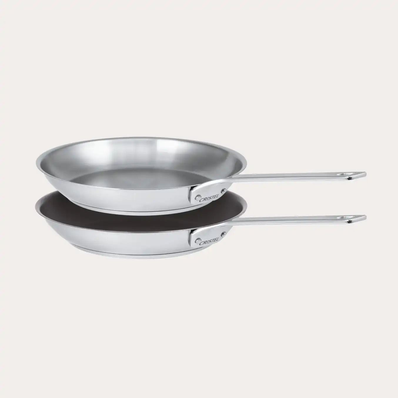 2-piece CRISTEL USA frying pans set with stainless steel bodies and mixed interiors, long handles, shown stacked on Tampa Home & Garden Store