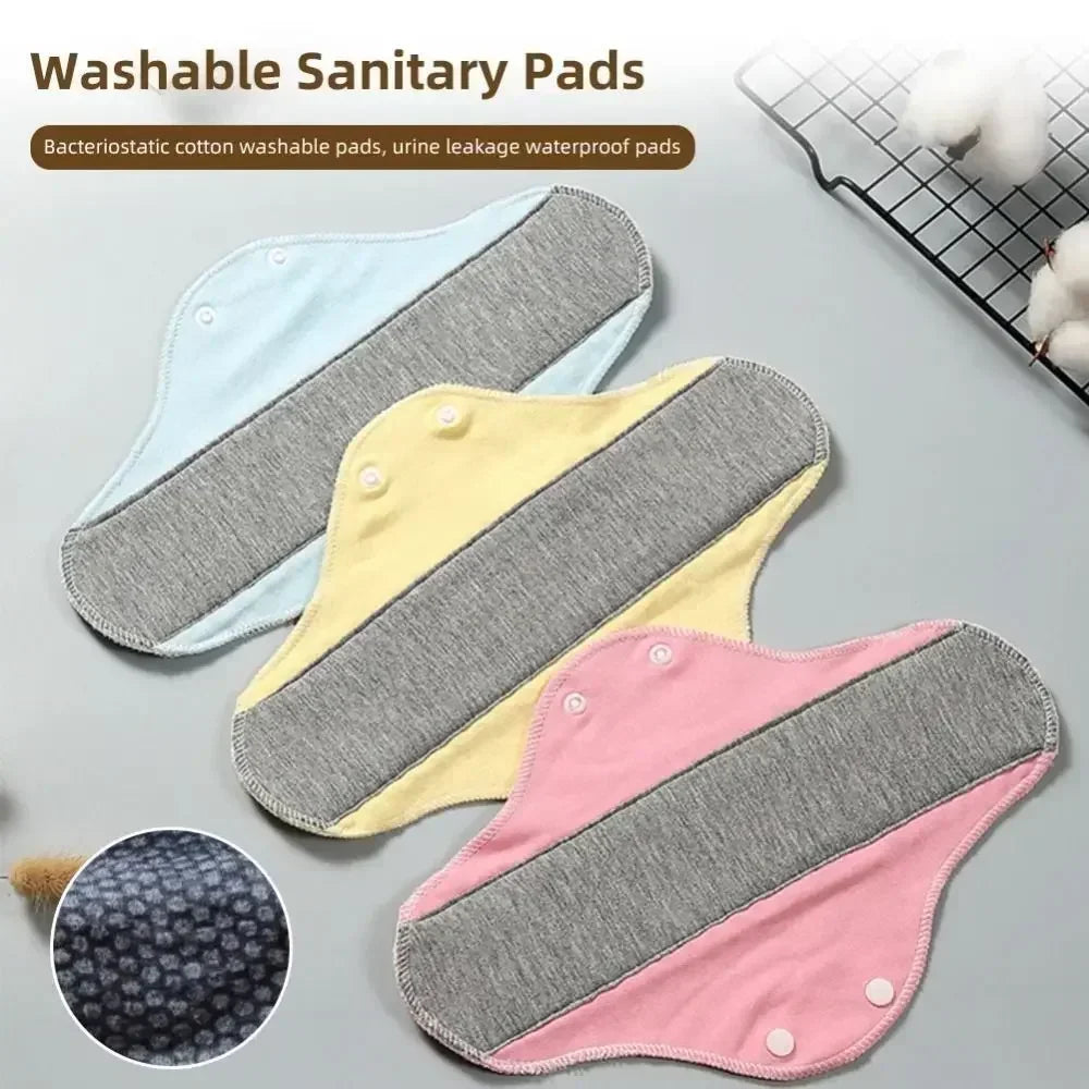 Reusable cotton menstrual pads 3-pack by Silcy Skin in blue yellow pink with gray non-slip center on Tampa Home & Garden Store
