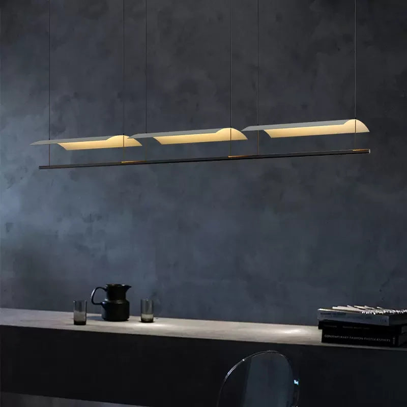 DecorBites kitchen island pendant lights, long black linear bar with three curved white shades on Tampa Home & Garden Store