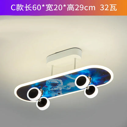 DecorBites Kids Skateboard LED Ceiling Light with blue deck and white rim LED four wheel accents on Tampa Home & Garden Store