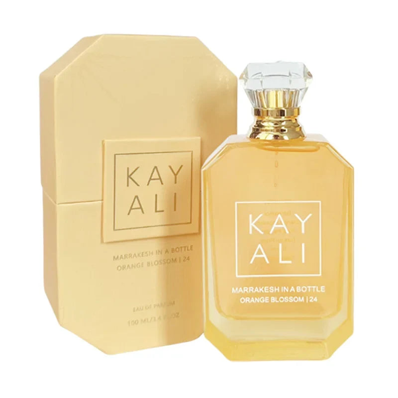 Kayali EDP Intense 100ml perfume bottle with golden-yellow liquid, square glass and crystal cap on Tampa Home & Garden Store