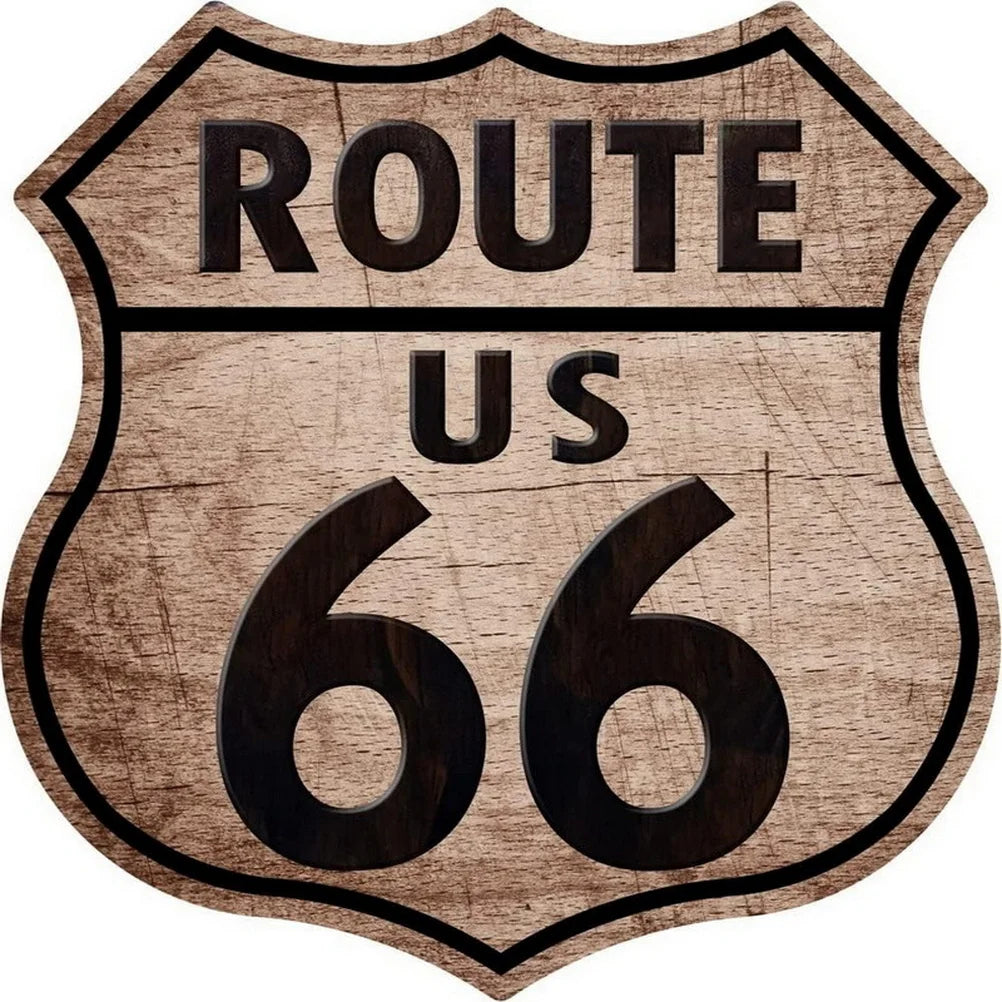Route 66 shield tin sign with US 66 on wood grain backdrop on Tampa Home & Garden Store