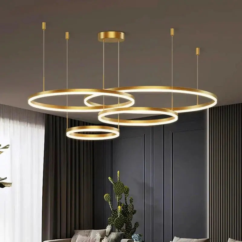DecorBites LED pendant chandeliers with gold-tone interlocking rings for stairs and living room on Tampa Home & Garden Store