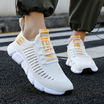 Training Shoes EstaliosFit white breathable mesh sneakers with orange accents on Tampa Home & Garden Store