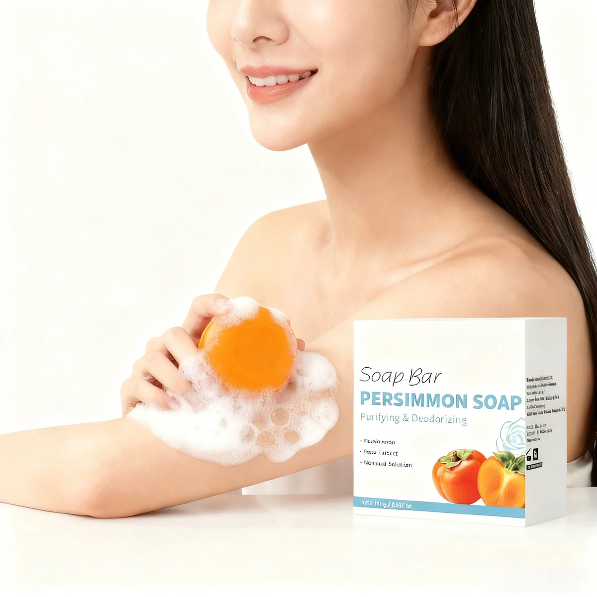 Persimmon Soap Bar by Silcy Skin, orange soap with foamy lather held by a smiling model on Tampa Home & Garden Store