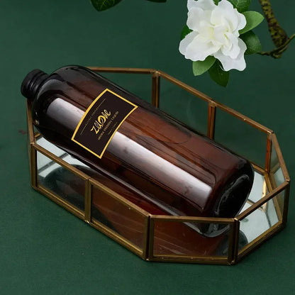 Silcy Skin flameless essential oil bottle amber glass with black cap in glass display frame on Tampa Home & Garden Store
