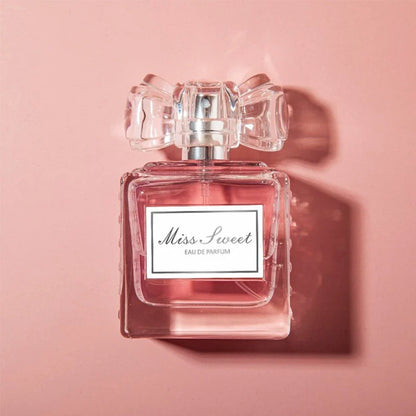 Miss Sweet perfume bottle pink eau de parfum with crystal bow cap; romantic floral notes on Tampa Home & Garden Store