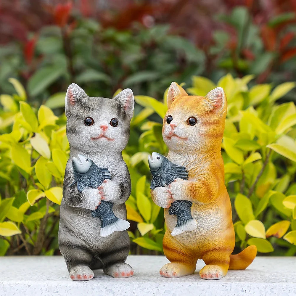 Cat figurine pair outdoor garden statues gray and orange cats holding fish Perfecsy on Tampa Home & Garden Store