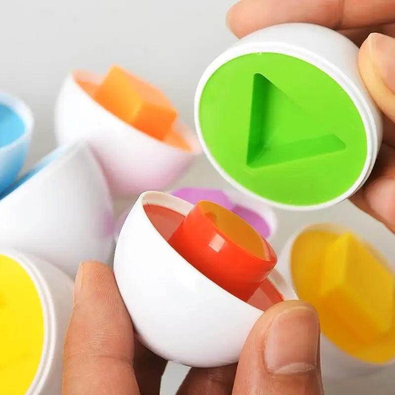 Montessori egg shape puzzle set with white shells and bright colored interior pieces on Tampa Home & Garden Store