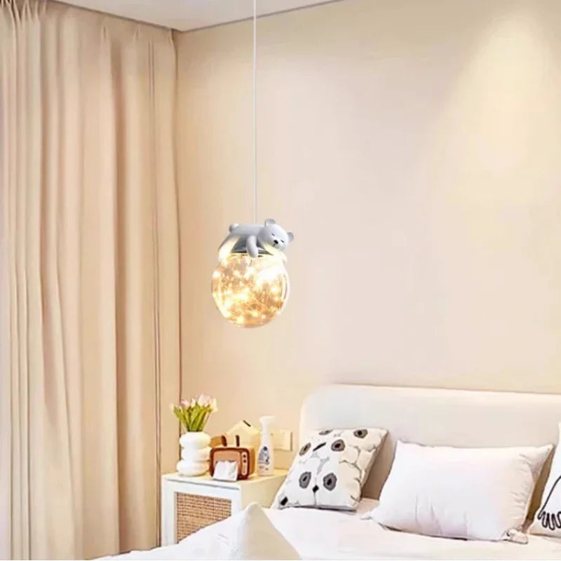 DecorBites Kids Room Bear Bunny Pendant Light with glass globe and warm lights over bedside on Tampa Home & Garden Store
