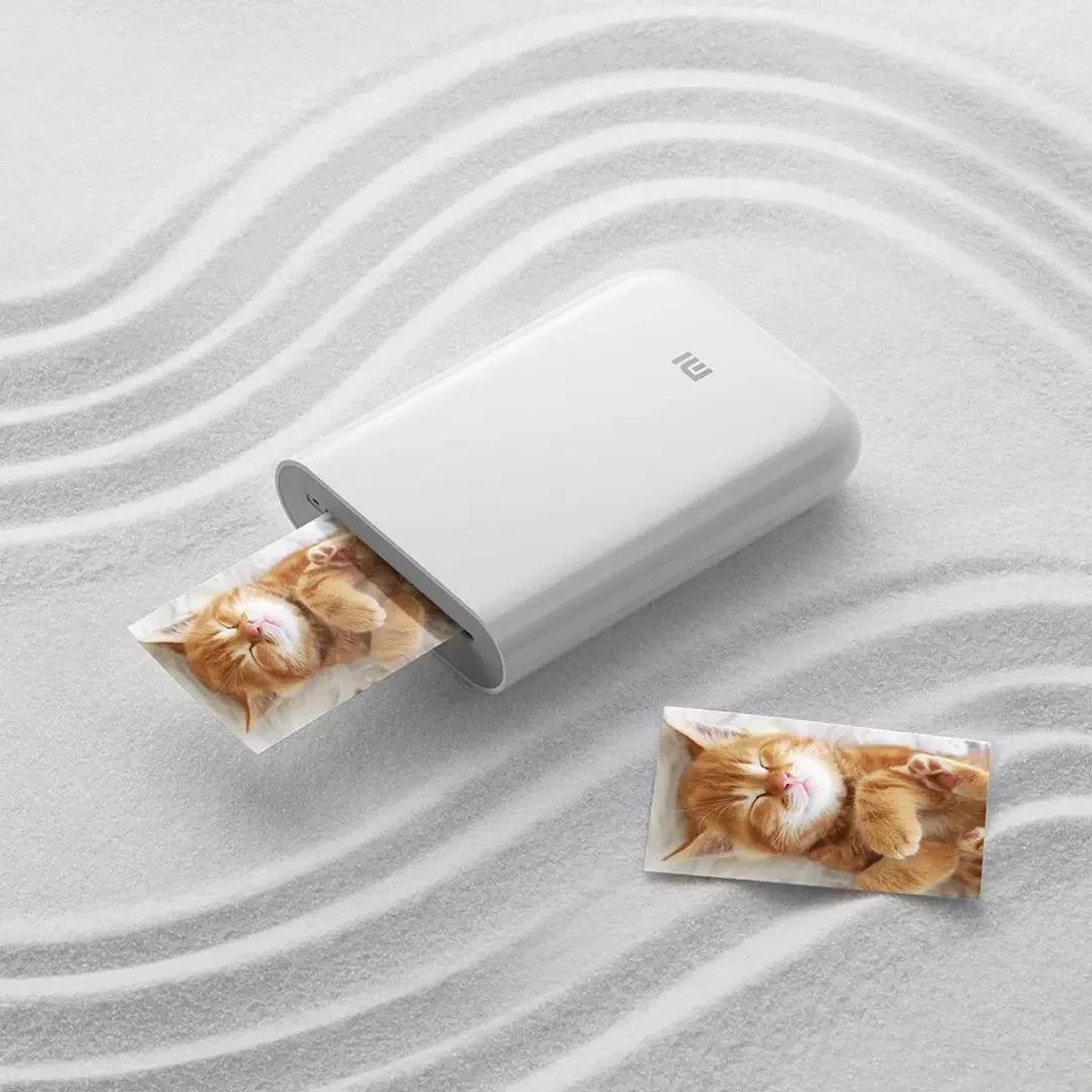 Portable Mini Photo Printer white by UpTrend Deals; prints two cat photos (300dpi) on Tampa Home & Garden Store