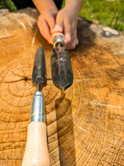 Sharp Shooter Trowel by Homestead Iron; black blade, wooden handle, 2 trowels on tree stump on Tampa Home & Garden Store