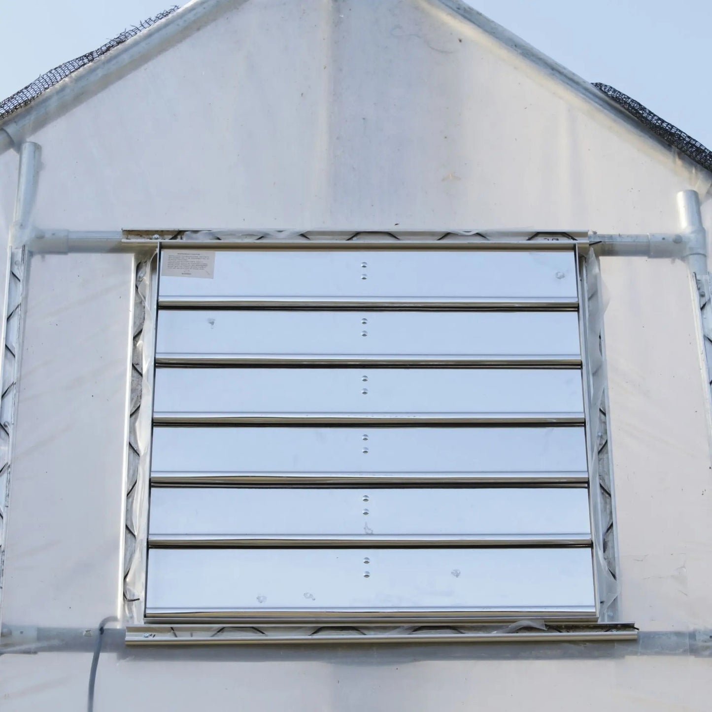 Ventilateurs d'extraction à montage sur volet de serre