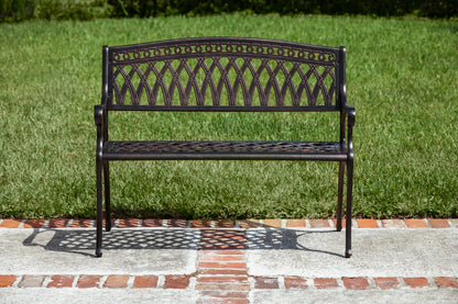 Simone cast aluminum outdoor bench in black with lattice back and decorative top rail on Tampa Home & Garden Store