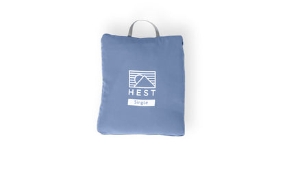 Top Sheet blue packaging pouch with HEST logo and mountain icon on Tampa Home & Garden Store