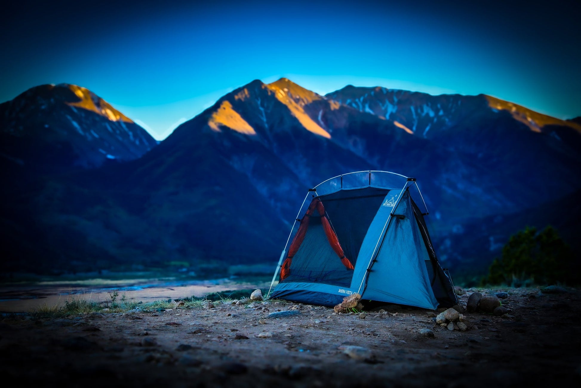 Sky View Solo Tent by Sky View Tents, blue camping tent with orange accents at riverside on Tampa Home & Garden Store