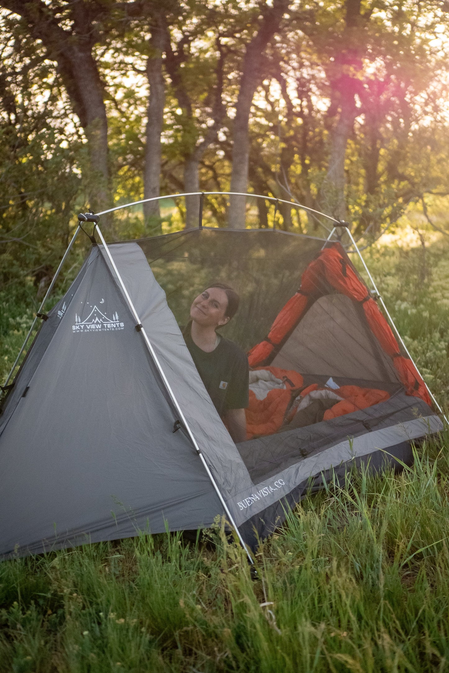 Sky View Duo Tent gray camp tent with orange sleeping bag inside Sky View Tents on Tampa Home & Garden Store