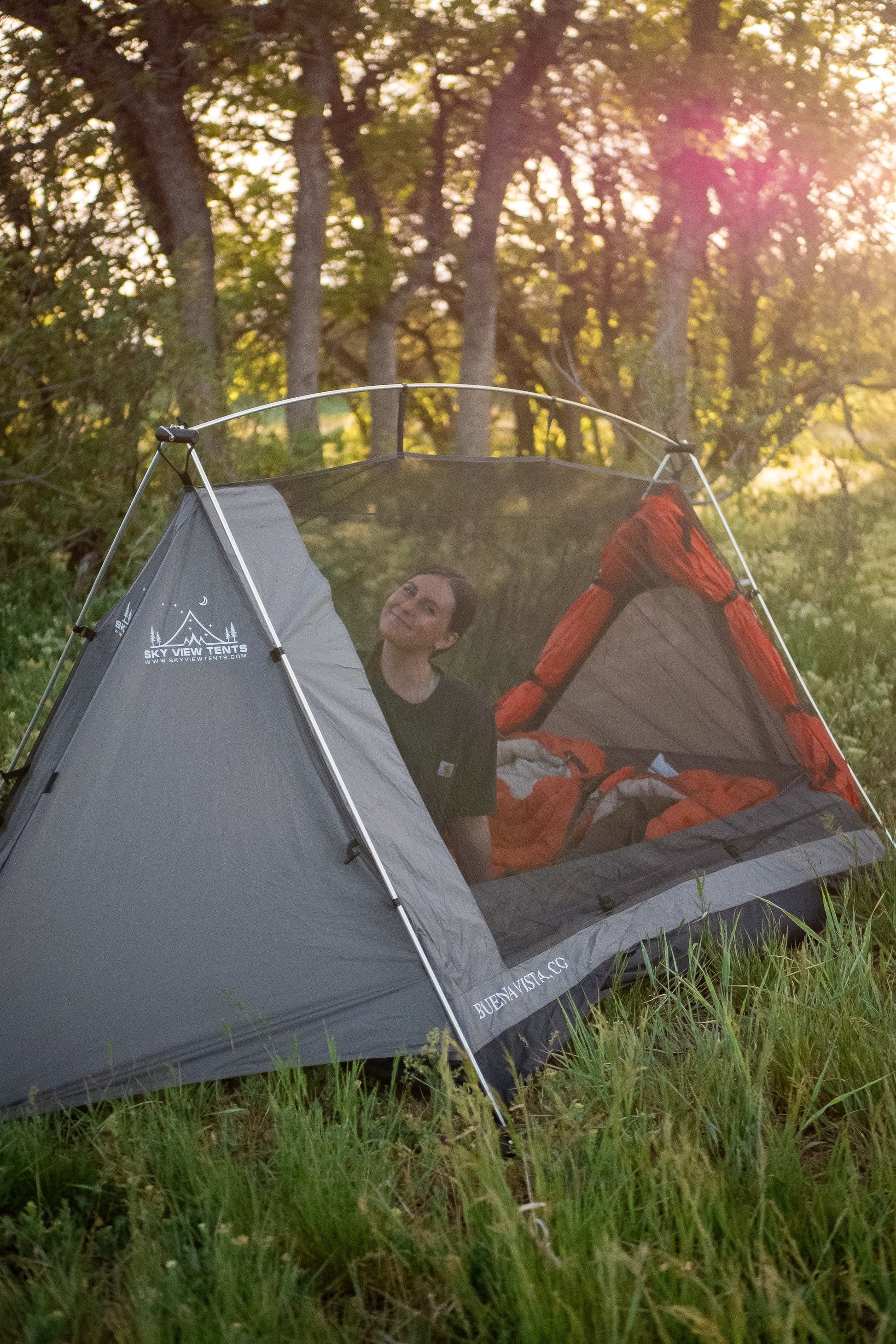 Sky View Duo Tent gray camp tent with orange sleeping bag inside Sky View Tents on Tampa Home & Garden Store