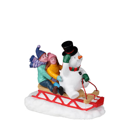 Sledding With Frosty - Tampa Home & Garden Store