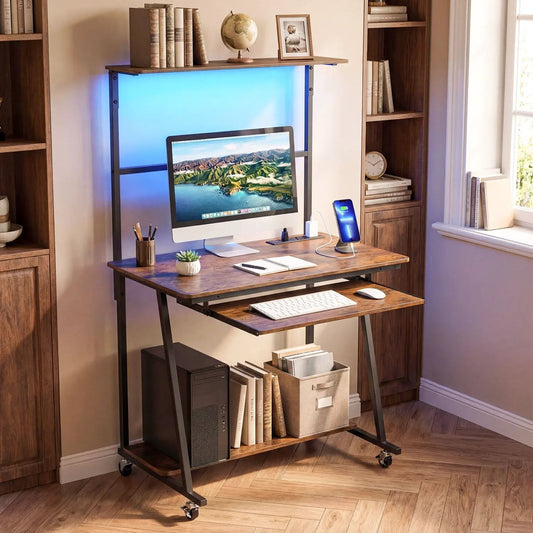 Small wooden computer desk with blue LED backlight, charging station, monitor, and rolling caster wheels on Tampa Home & Garden Store