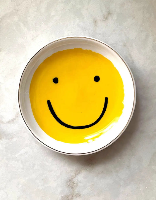 Smiley porcelain trinket dish, round white with bright yellow smiley face on Tampa Home & Garden Store