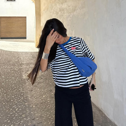 Myra Mini Bag cobalt RPET circular-handle top-zip shoulder bag by Lefrik USA worn crossbody on Tampa Home & Garden Store