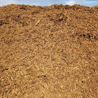 Soil and mulch delivered in separate piles. Mulch shown here.