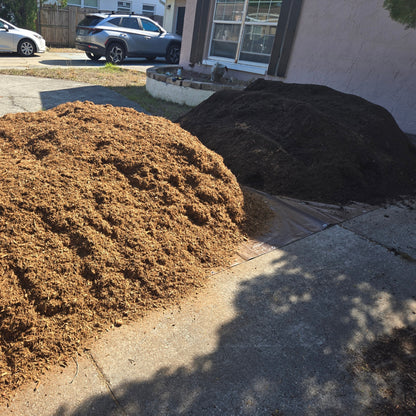 Mulch and soil delivered together saves money; dumped in separate piles.