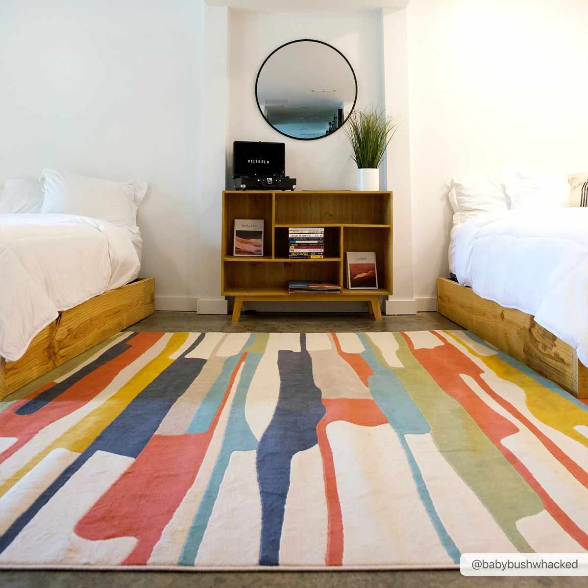 Southfields Colorful Modern Area Carpet multicolor abstract striped rug in a bedroom on Tampa Home & Garden Store
