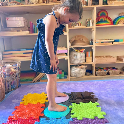 Spin Discs Rotana Set play mats with round balance discs and interlocking tiles by TINNITOTS on Tampa Home & Garden Store