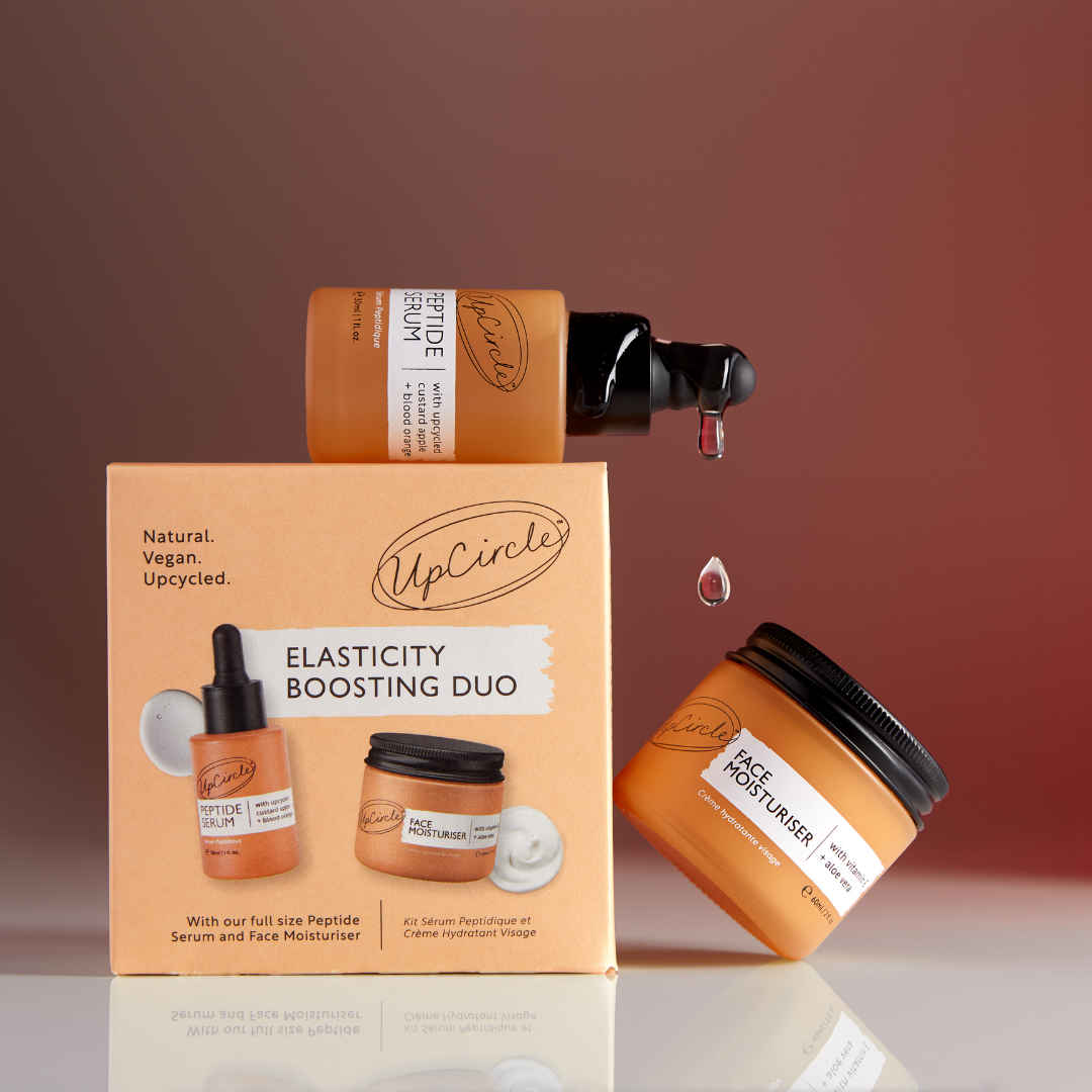 Elasticity Boosting Duo UpCircle peptide serum and moisturiser kit in orange packaging on box on Tampa Home & Garden Store